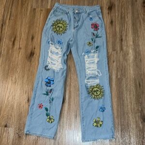 Women  distressed flower jeans